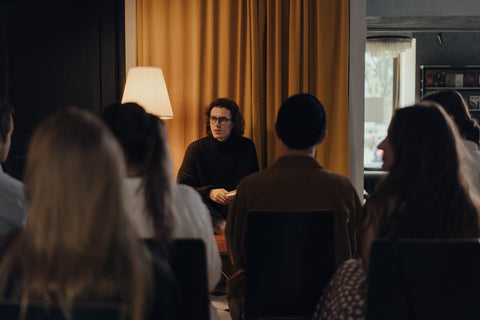 Professional writer speaking to a group of people